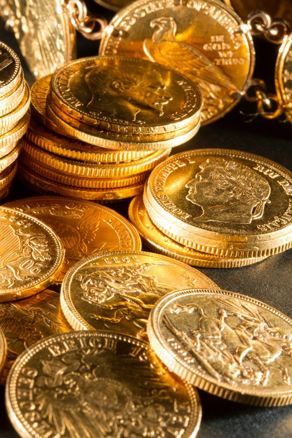 Investir dans une pièce en or : guide de l'achat et revente
